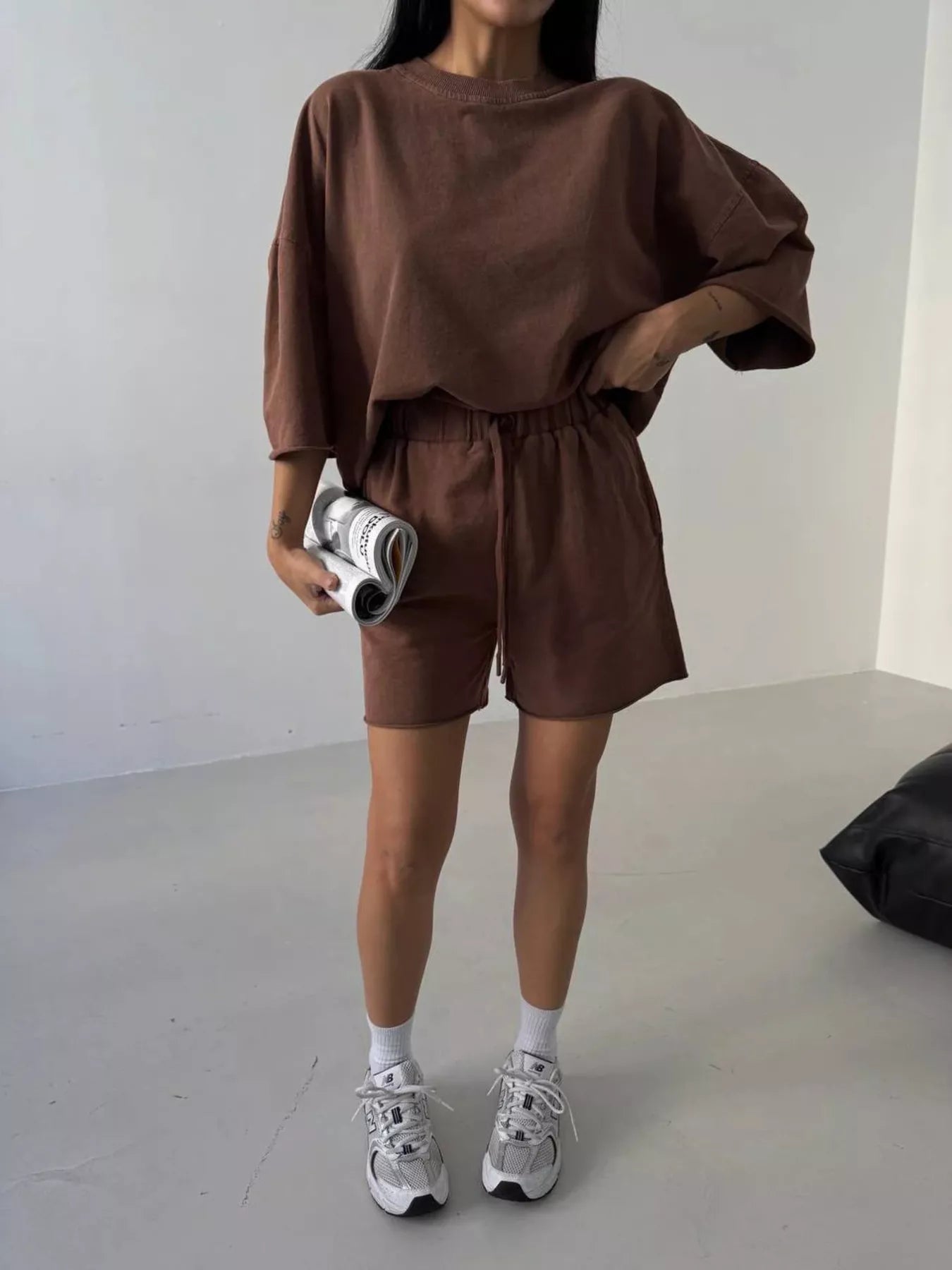 Vintage wash oversized lounge set with tee and shorts from Trendsi, featuring relaxed fit and casual, comfortable style.