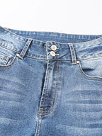 High waist distressed straight leg jeans by Trendsi, showing a close-up of the distressed denim fabric and classic fit.