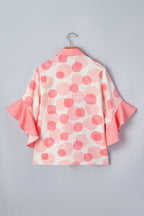 Light pink Angelica short sleeve babydoll blouse by Threaded Pear, featuring a relaxed fit and feminine design.