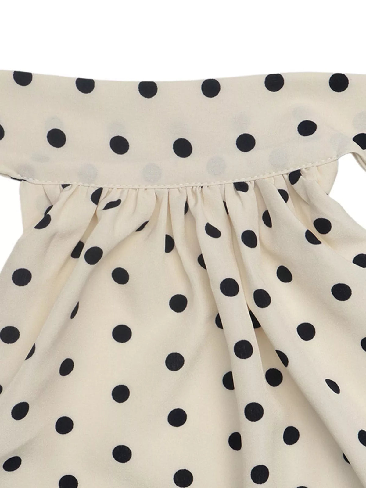 Polka dot halter neck mini dress from Plush Fashion Hub, featuring a stylish halter neckline and playful polka dot pattern.