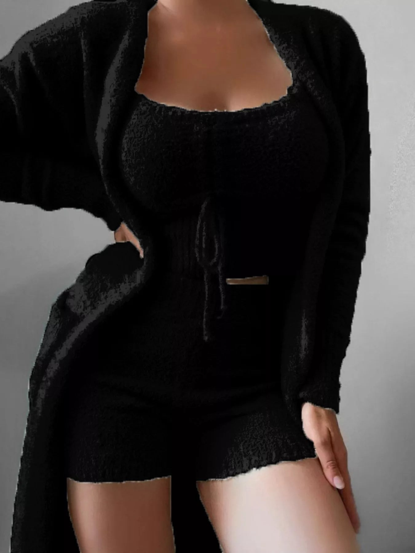 Plus size cozy plush top, shorts, and cardigan set by Trendsi, featuring soft, comfortable loungewear in a stylish three-piece design.