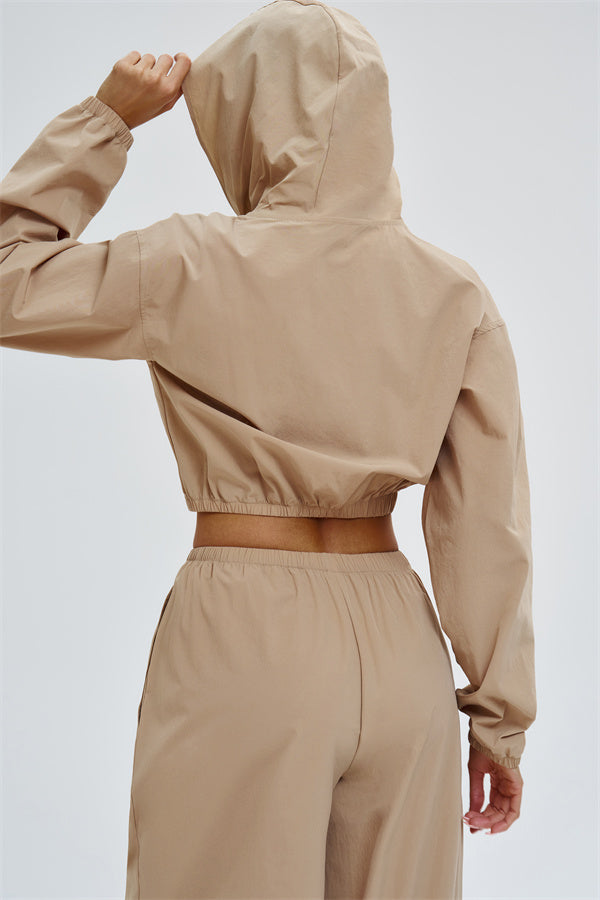 Svelte UV protection crop hoodie by Fitglutes Activewear featuring a fitted design and breathable fabric for activewear and workouts.