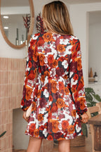 Flowy Marianna Sleeve Mini Dress with floral pattern by Threaded Pear, showcasing lightweight fabric and elegant sleeve design.