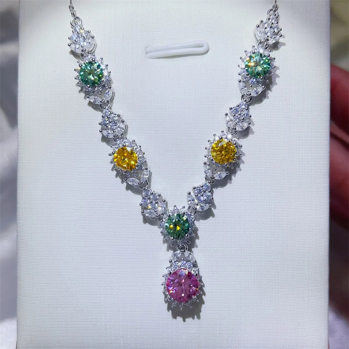 Sterling silver necklace with a 3.5 carat moissanite gemstone, showcasing a sparkling, elegant jewelry design.
