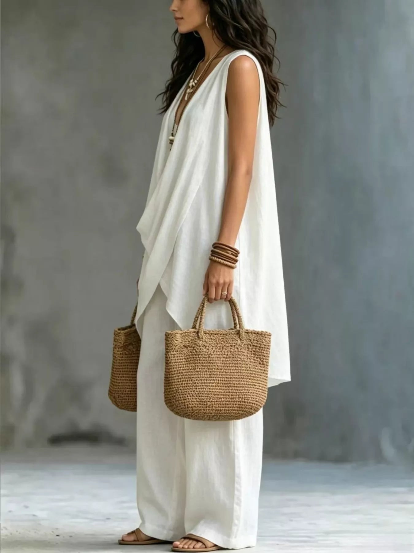 Plush Fashion Hub sleeveless asymmetrical top and wide-leg pants set, featuring modern design and comfortable fit.