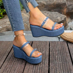 Shopimist denim wedge sandals with clear straps, featuring a stylish heel and casual summer design perfect for warm weather.