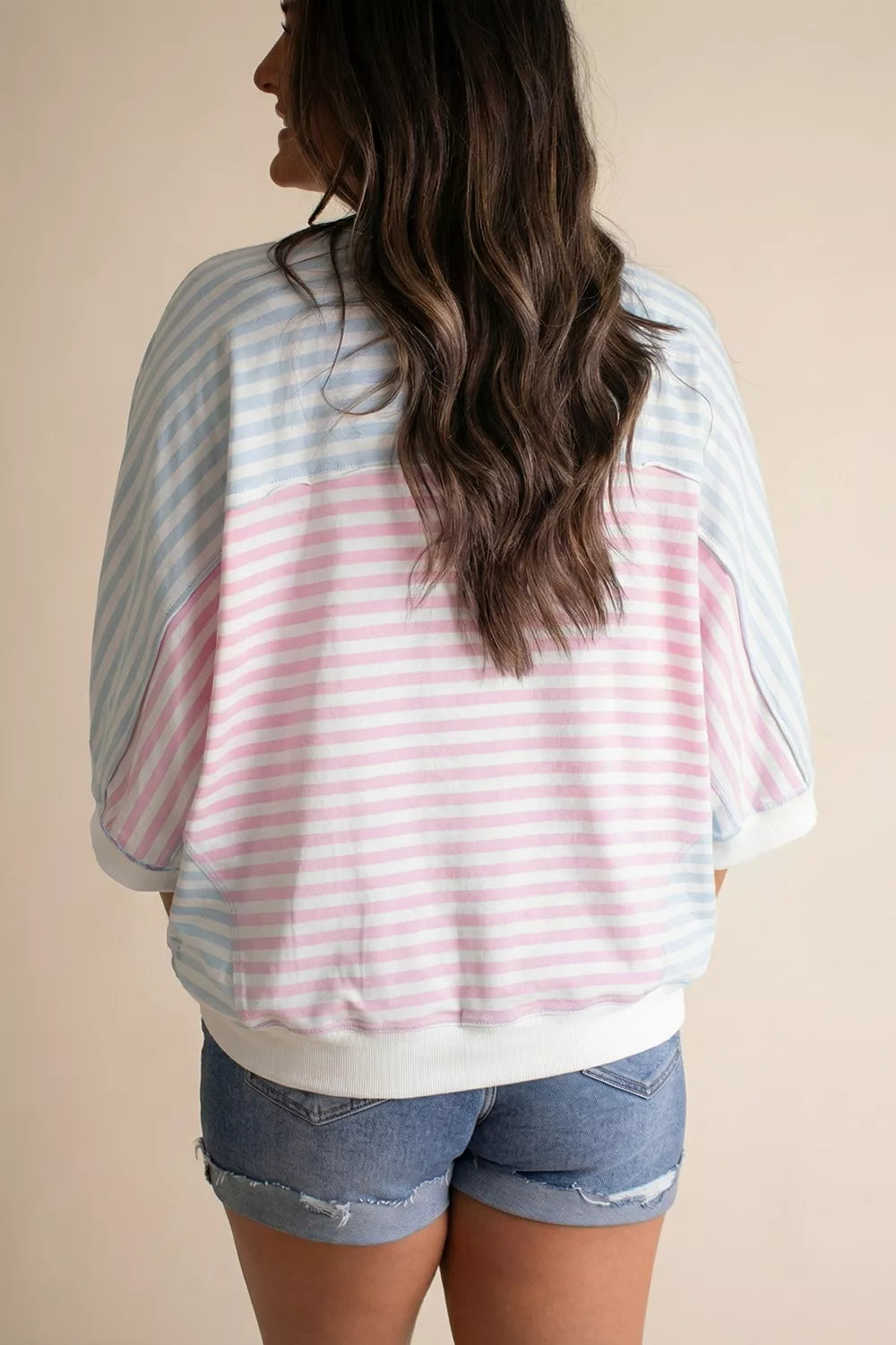 Casual oversized striped dolman sleeve patchwork T-shirt by Plush Fashion Hub, featuring relaxed fit and colorful patch details.