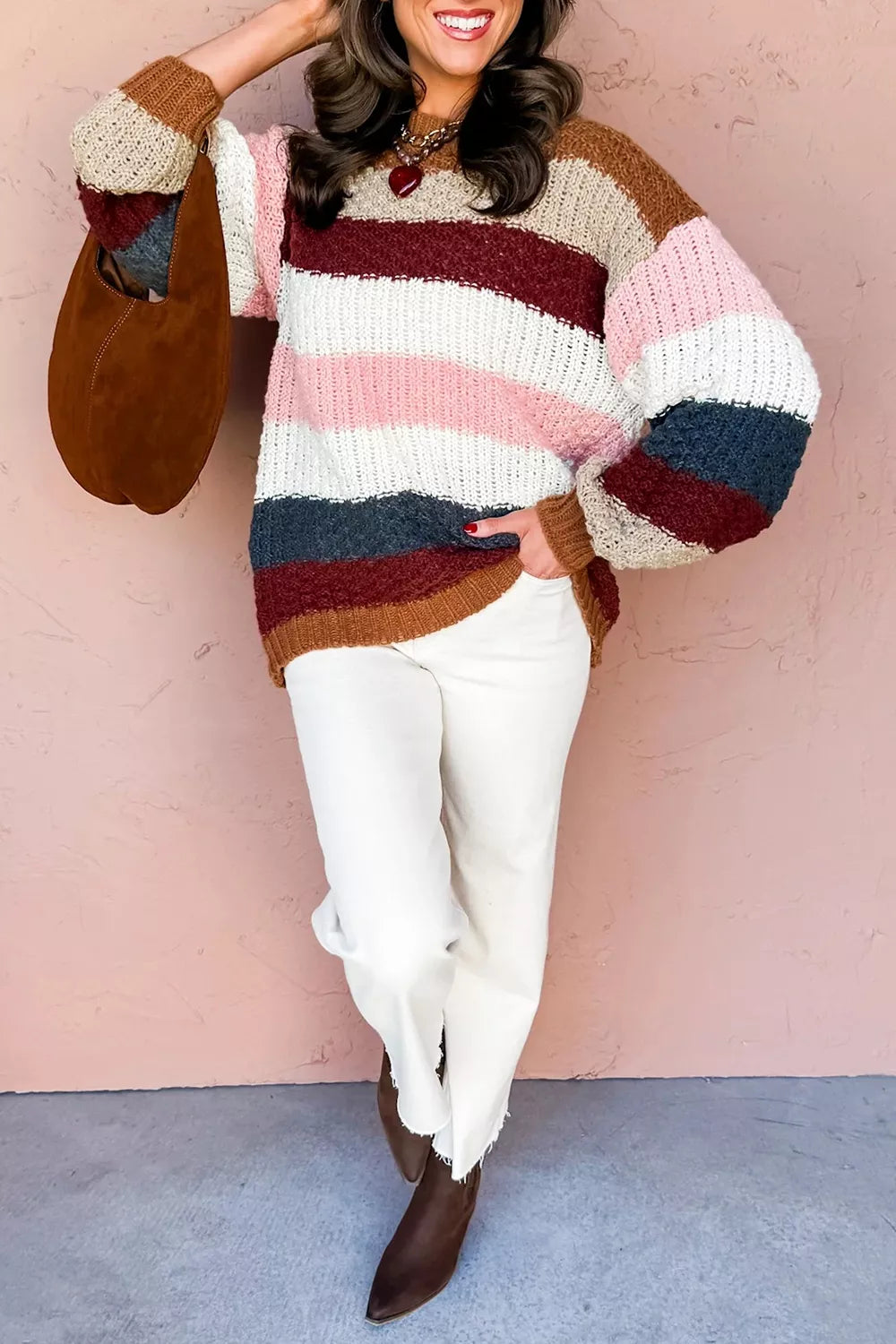 Striped knit dropped shoulder round neck sweater by Trendsi, featuring cozy fabric and casual style.