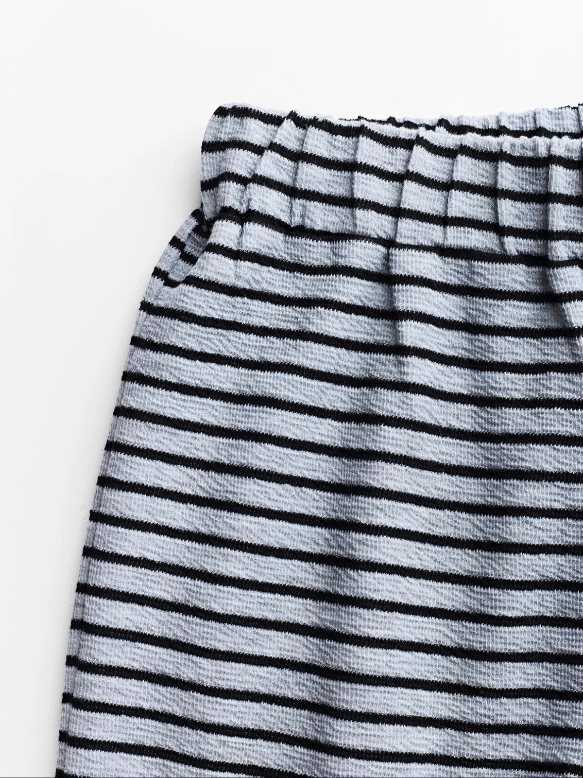 Striped crop top and wide-leg pants outfit set by Plush Fashion Hub, featuring a stylish coordinated dress with bold stripes.