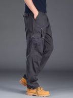 Plus size men's casual cargo pants by Trendsi, showing front view with multiple pockets and comfortable fit in neutral color.