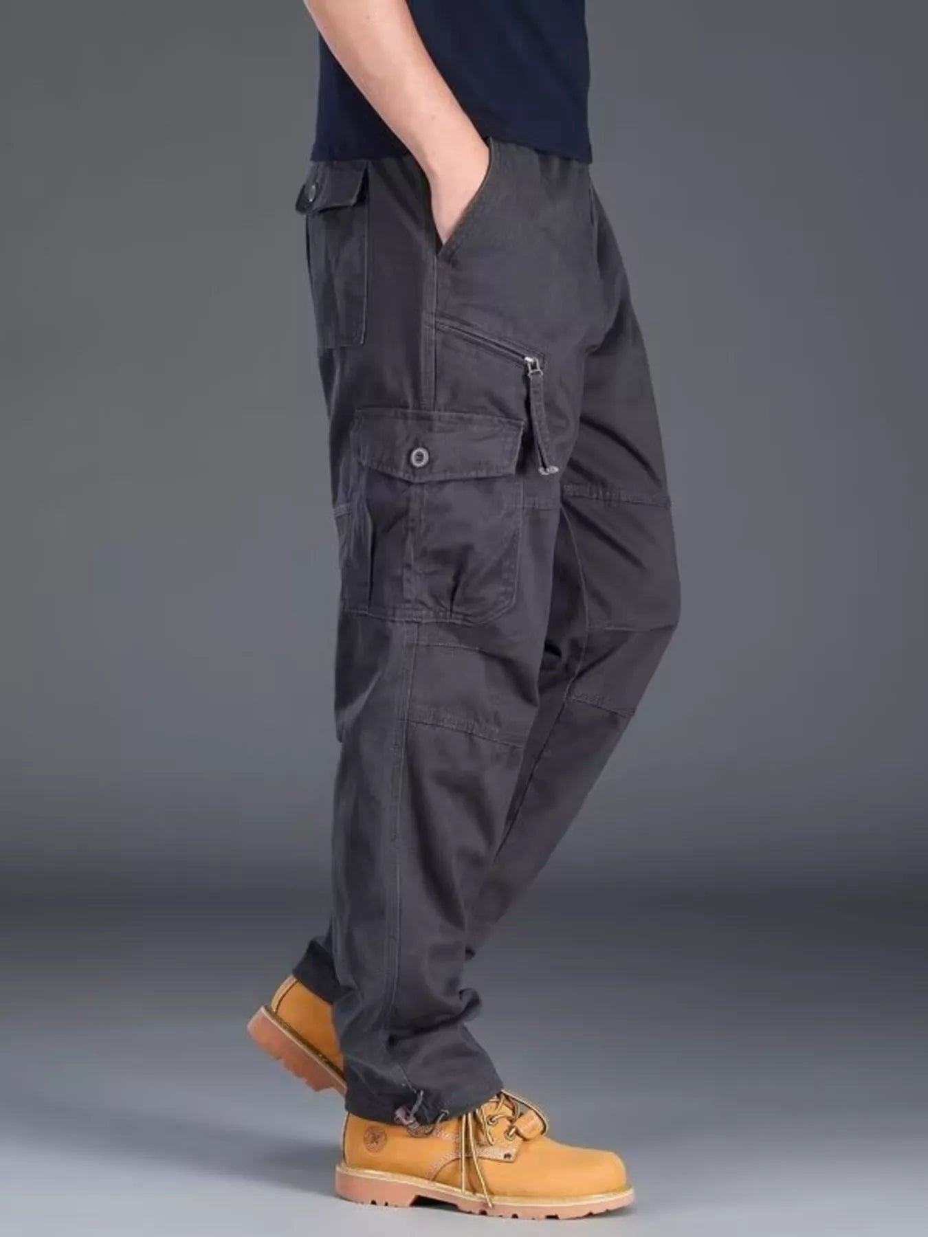 Plus size men's casual cargo pants by Trendsi, showing front view with multiple pockets and comfortable fit in neutral color.