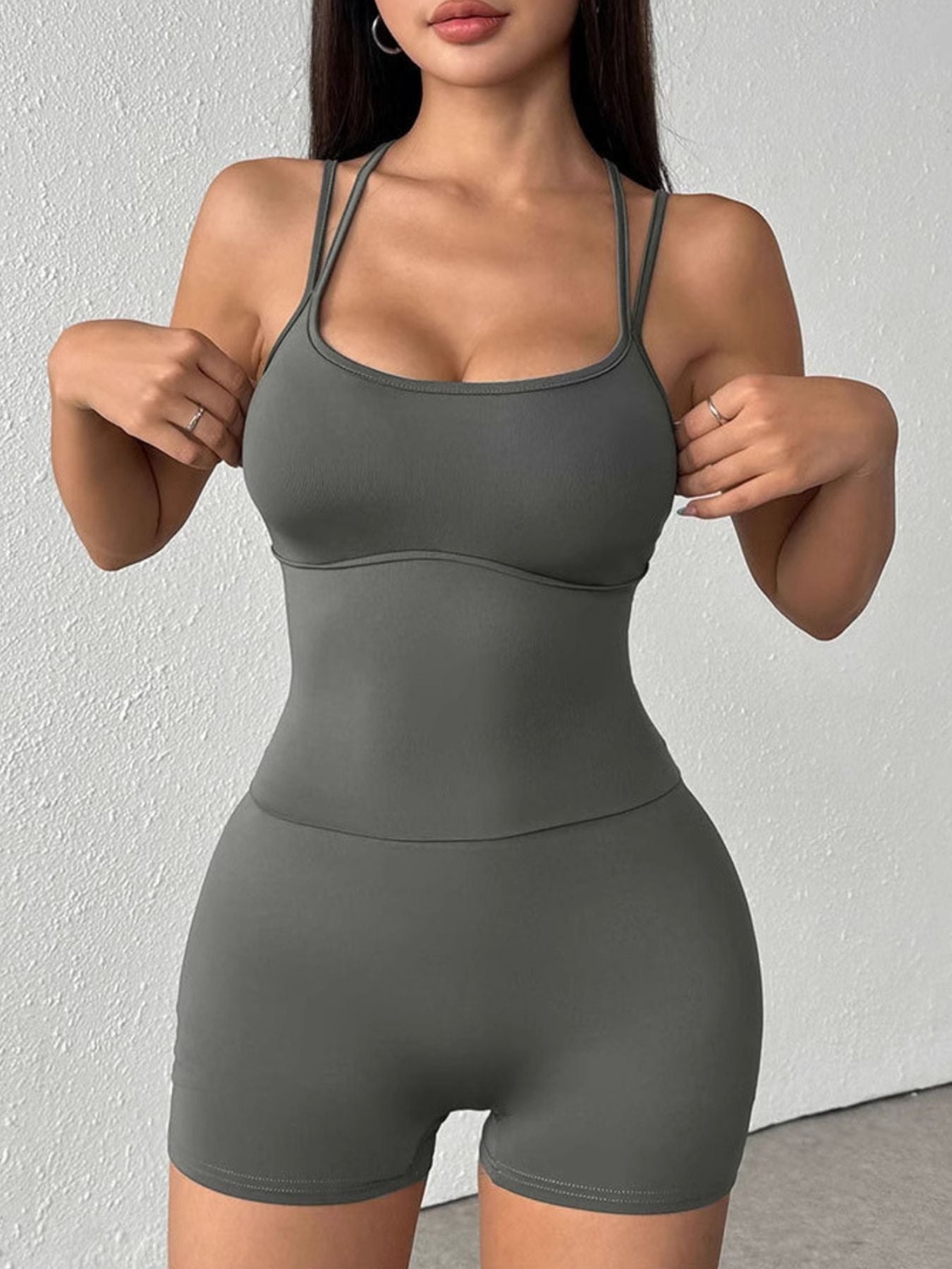 Plush Fashion Hub double spaghetti strap active romper with a fitted, sleeveless design and lightweight fabric for casual wear.