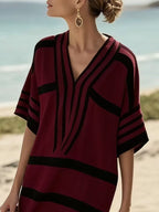 Plus size women's striped half-sleeve midi dress by Plush Fashion Hub, casual chic everyday wear with a comfortable fit.