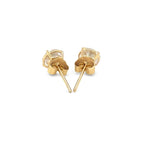 14k yellow gold stud earrings with white faceted cubic zirconia, showcasing elegant jewelry design.