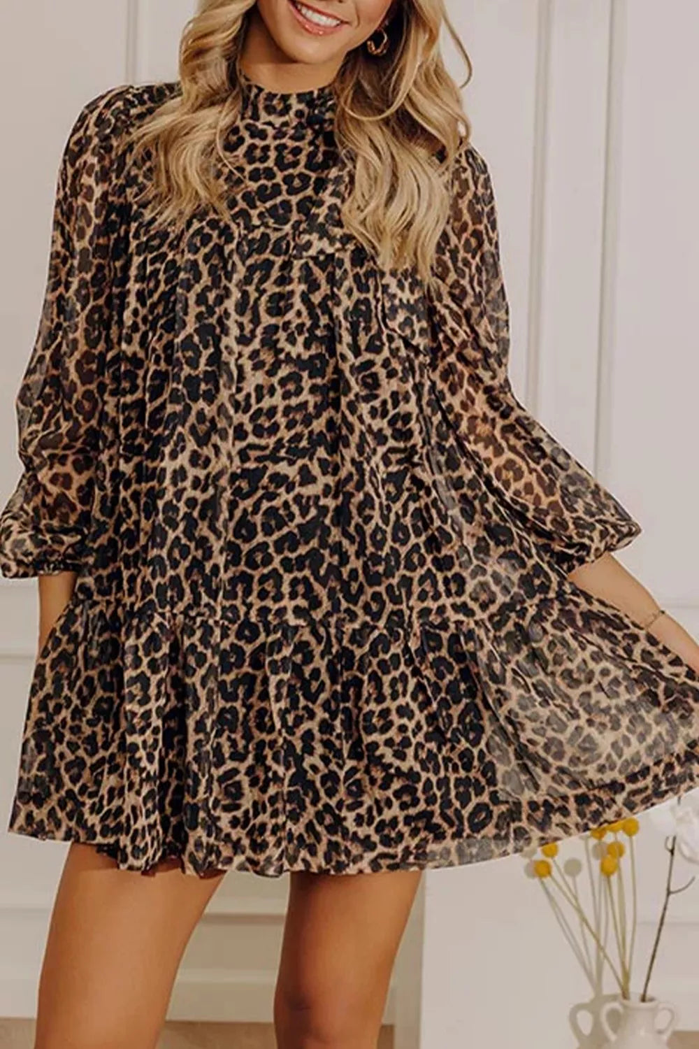 Leopard print long sleeve short shift dress by Shopimist, featuring a stylish and comfortable design with a bold animal pattern.
