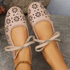 Floral cutout tied slip-on sandals by Plush Fashion Hub featuring open-toe design and casual summer style.
