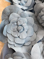 Floral applique strapless denim dress from Trendsi featuring a fitted bodice and decorative floral details.