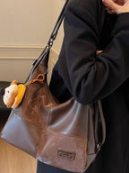 Vintage-inspired PU leather slouchy hobo shoulder bag with a relaxed design and spacious interior, crafted by Trendsi.