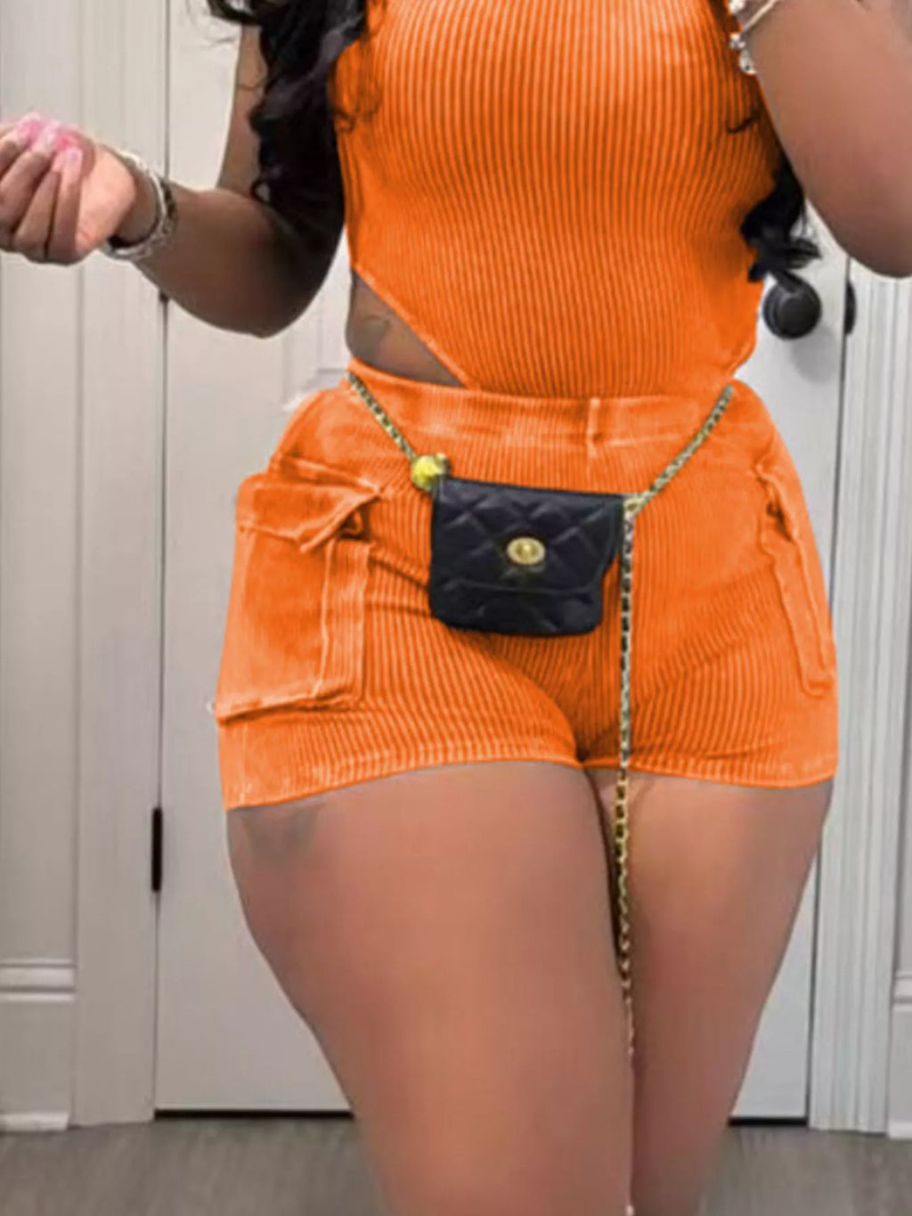 Ribbed knit bodysuit and shorts set by Shopimist, featuring a fitted two-piece design with textured fabric and casual style.