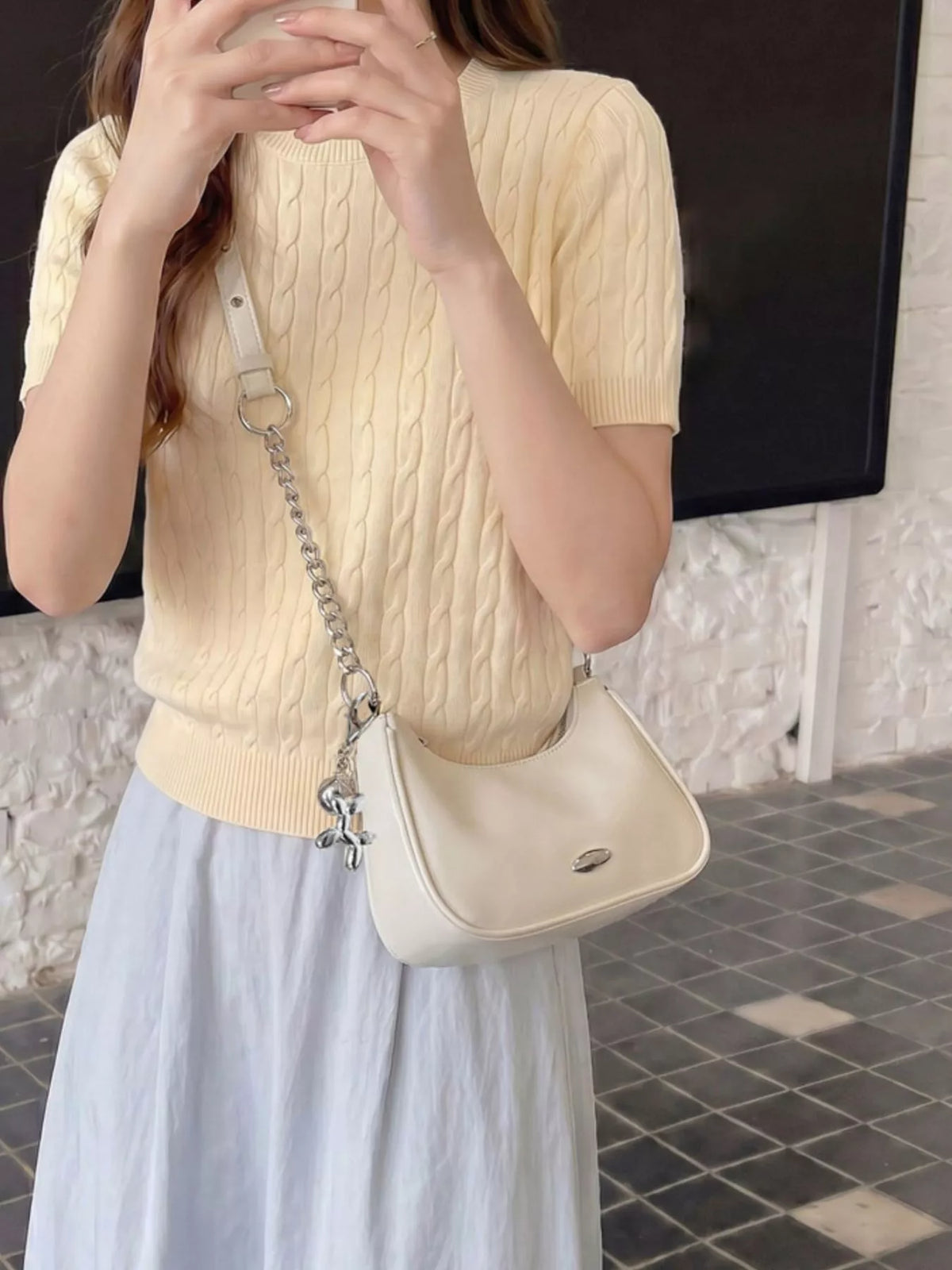 Trendsi PU leather shoulder handbag with top handle, featuring sleek design and silver hardware on a neutral background.