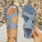 Shopimist crisscross mesh sandals with open-toe design, featuring stylish crisscross straps and a comfortable flat sole.