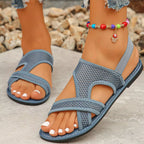 Shopimist crisscross mesh sandals with open toe design and ankle strap, showcasing stylish summer footwear.