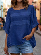 Loose-fitting Plush Fashion Hub top with crew neck and three-quarter sleeves, casual and comfortable women's clothing.