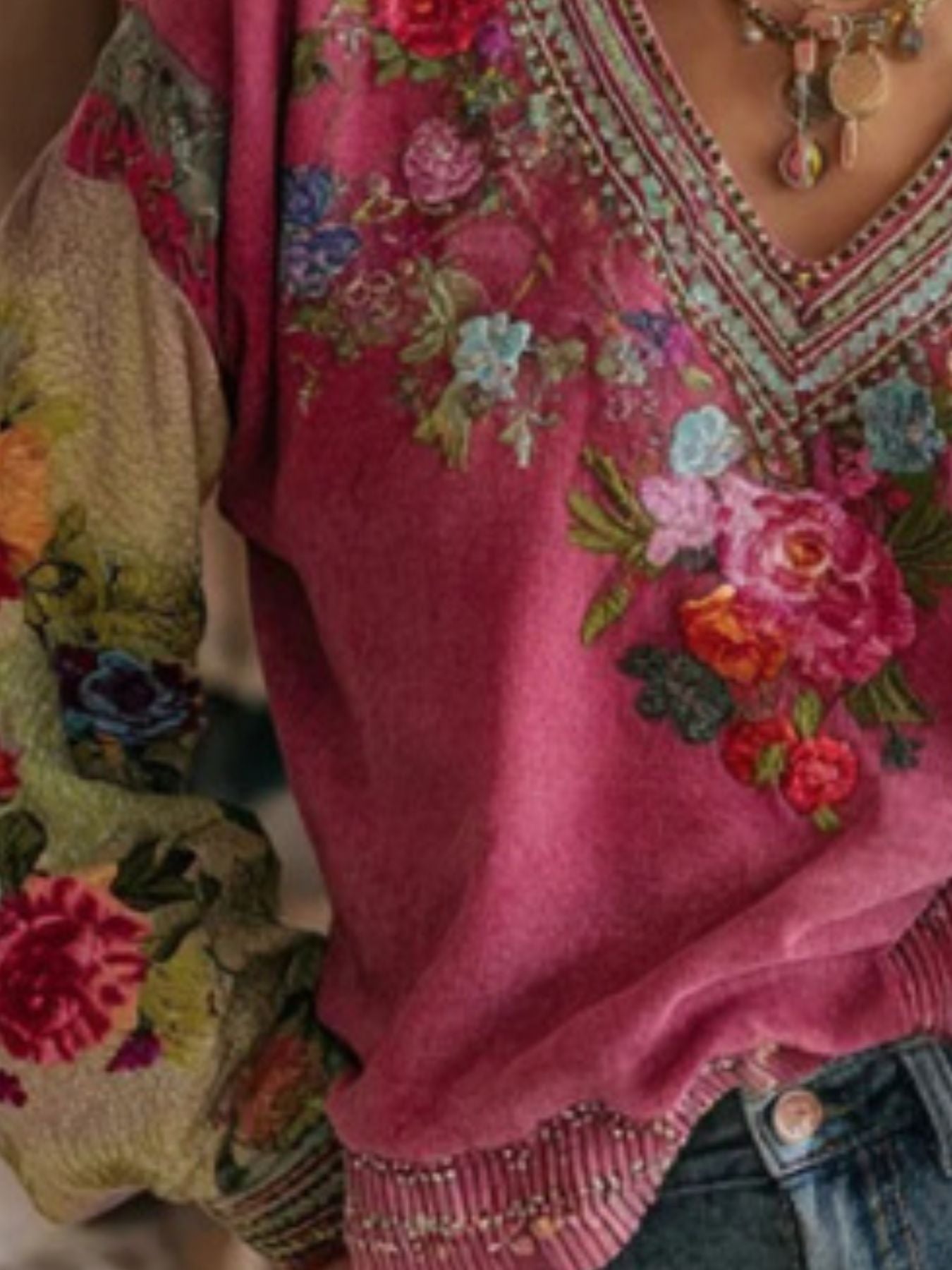 Floral embroidered V-neck blouse by Plush Fashion Hub, elegant plus size women's top with intricate embroidery and flowing fabric.