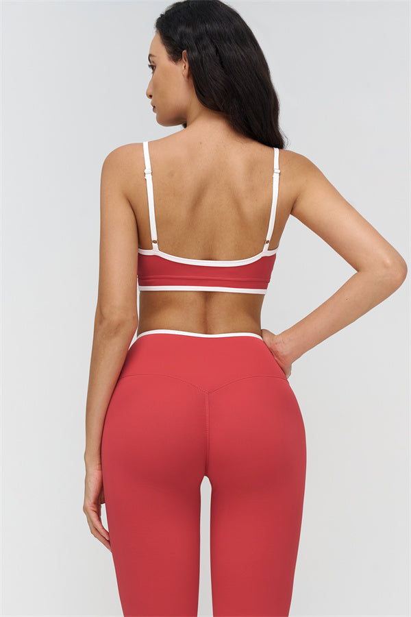 Fitglutes activewear Crave Contrast Sports Bra and Leggings 2-piece set, featuring black and vibrant color block design for workout comfort.