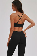 Fitglutes Activewear Cross Back Sports Bra and leggings 2-piece set, black athletic gymwear for workout and fitness activities.