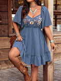 Embroidered flutter sleeve mini dress by Shopimist featuring delicate embroidery, lightweight fabric, and a stylish, feminine silhouette.