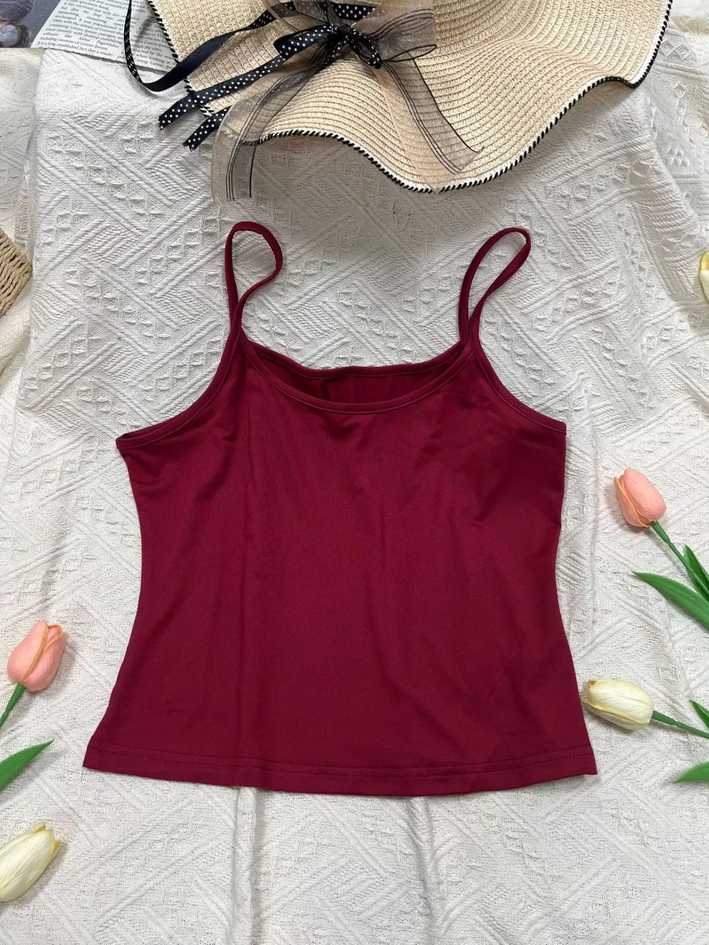 Solid color scoop neck camisole tank top from Plush Fashion Hub, featuring a sleeveless design and comfortable fit.