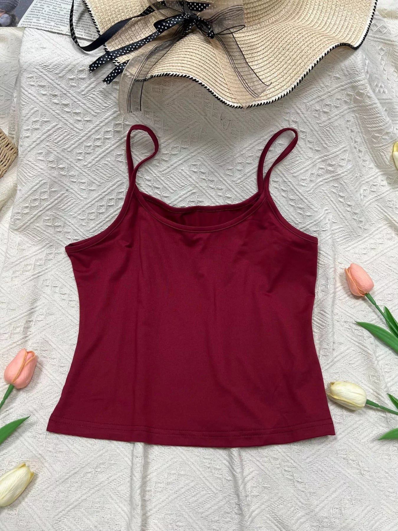 Solid color scoop neck camisole tank top from Plush Fashion Hub, featuring a sleeveless design and comfortable fit.
