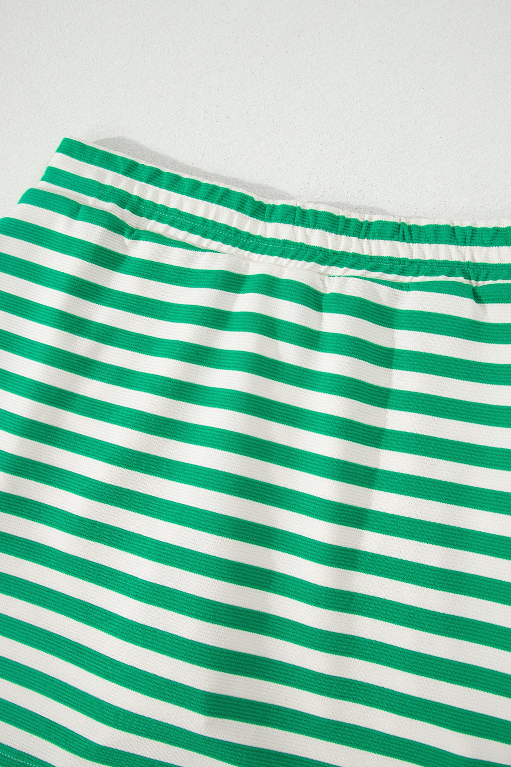 Threaded Pear Ruth sleeveless 2-piece skort set featuring a stylish top and matching skirt for a fashionable look.