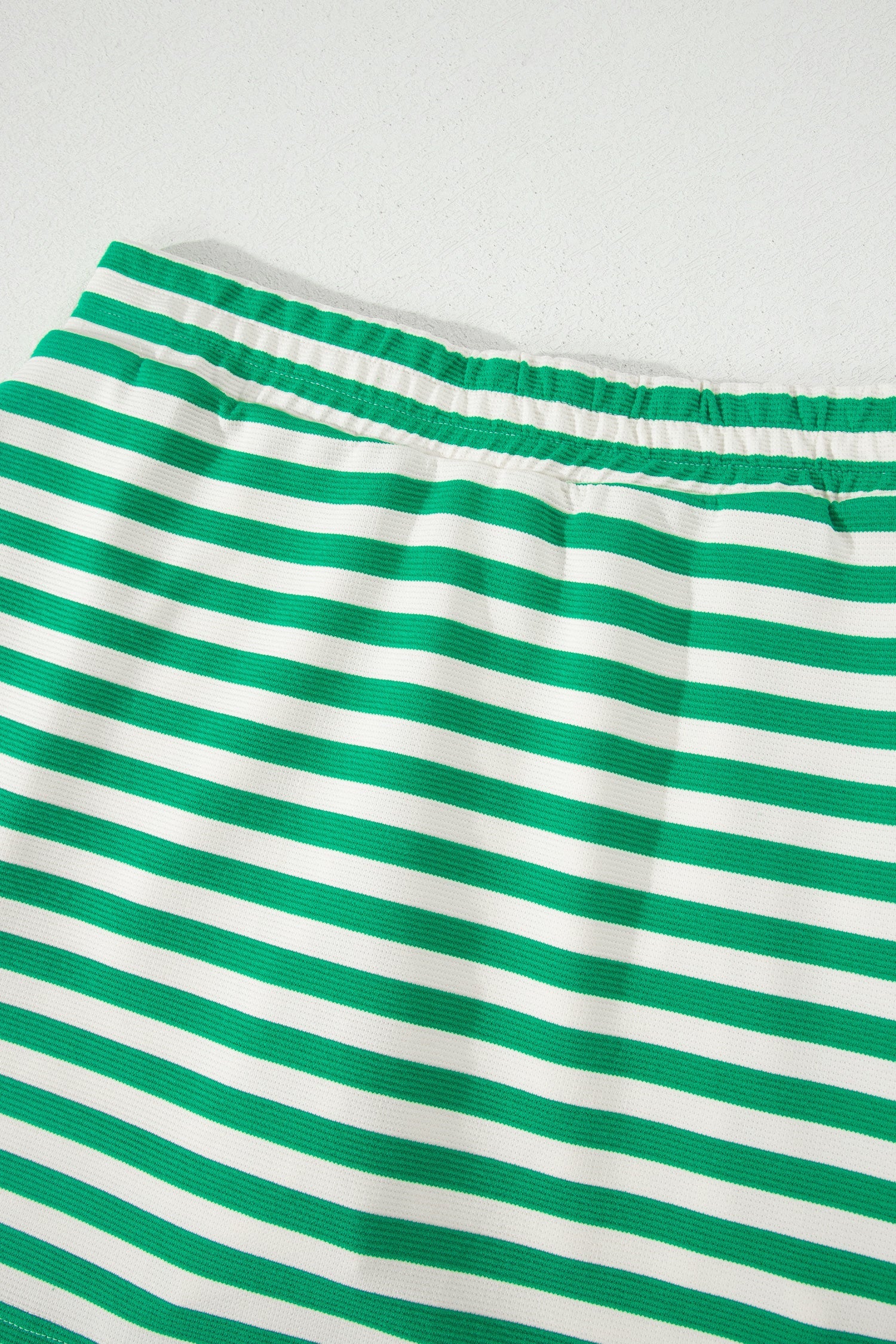 Threaded Pear Ruth sleeveless 2-piece skort set featuring a stylish top and matching skirt for a fashionable look.