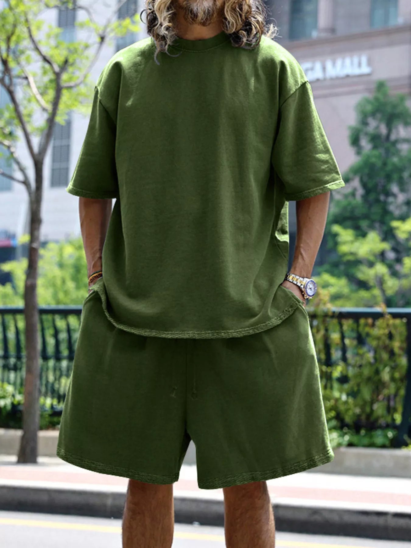 Men's relaxed fit T-shirt and shorts set by Trendsi, plus size casual tops and shorts for comfortable summer wear.