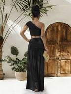 Plush Fashion Hub one-shoulder top and ruched maxi skirt set, stylish black tops and flowy skirt, perfect for chic summer outfits.