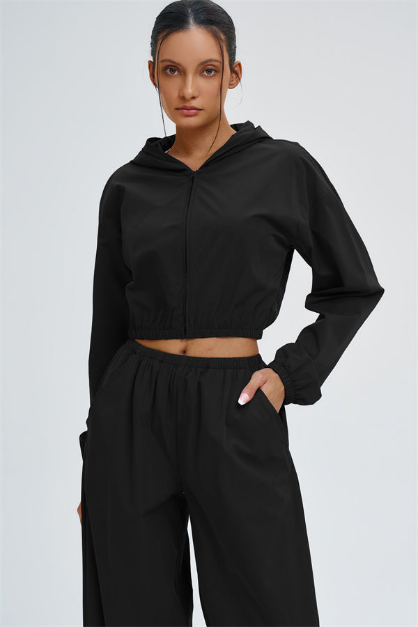 Svelte UV protection crop hoodie by Fitglutes Activewear, lightweight gymwear with long sleeves and breathable fabric.