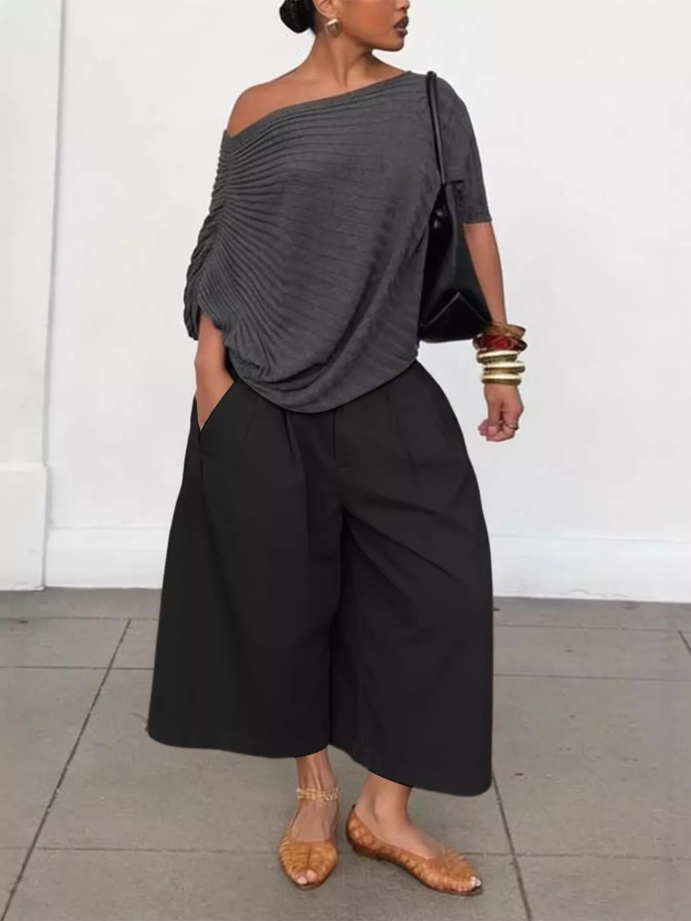 Plush Fashion Hub wide-leg cropped pants in soft fabric, featuring a relaxed fit and stylish design.