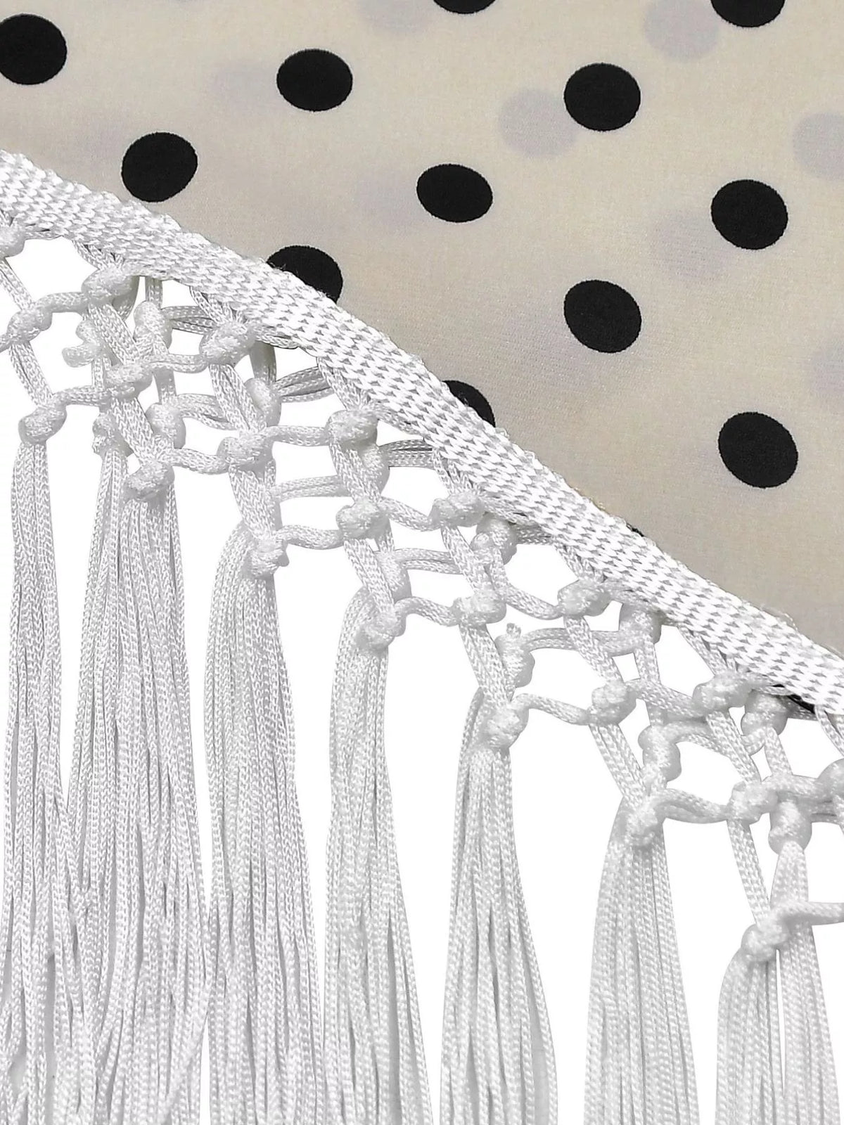 Polka dot halter neck cami and fringe trim pants set featuring rings from Plush Fashion Hub, shown on a hanger.