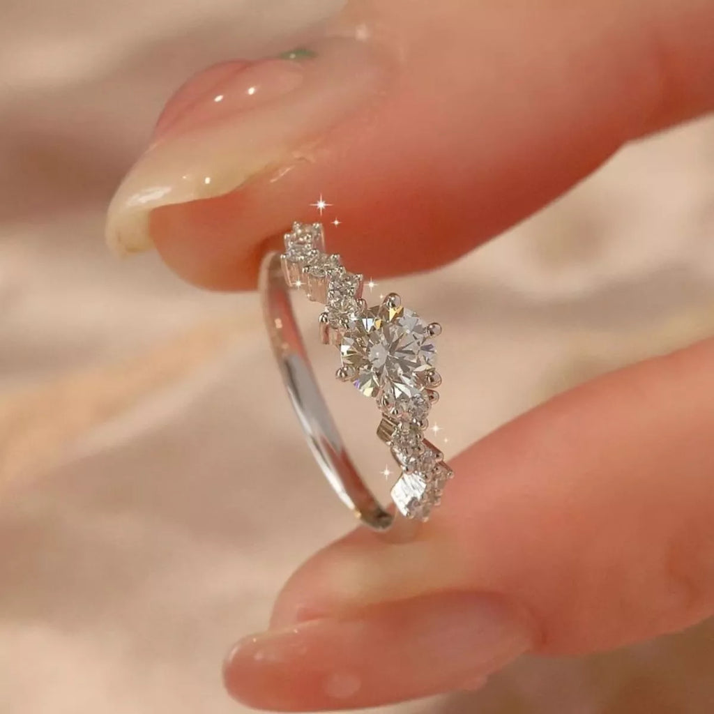 Sterling silver moissanite ring with 2 carats from Shopimist, featuring a sparkling central gemstone and elegant band design.