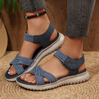Women's open toe woven strap flat sandals by Trendsi, featuring comfortable faux leather slides and casual summer style.