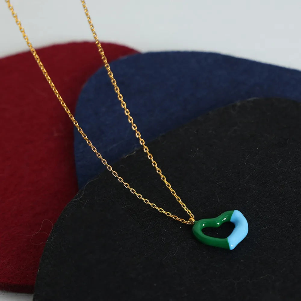 Heart pendant titanium steel necklace with a sleek, polished finish, featuring a delicate chain and a stylish heart-shaped pendant.