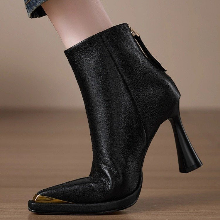Women’s pointed-toe chunky-heel side-zip boots by FitiqueFit featuring black leather and stylish silhouette.