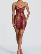 Lace detail tube mini dress by Trendsi featuring fitted silhouette and delicate lace accents, perfect for stylish occasions.