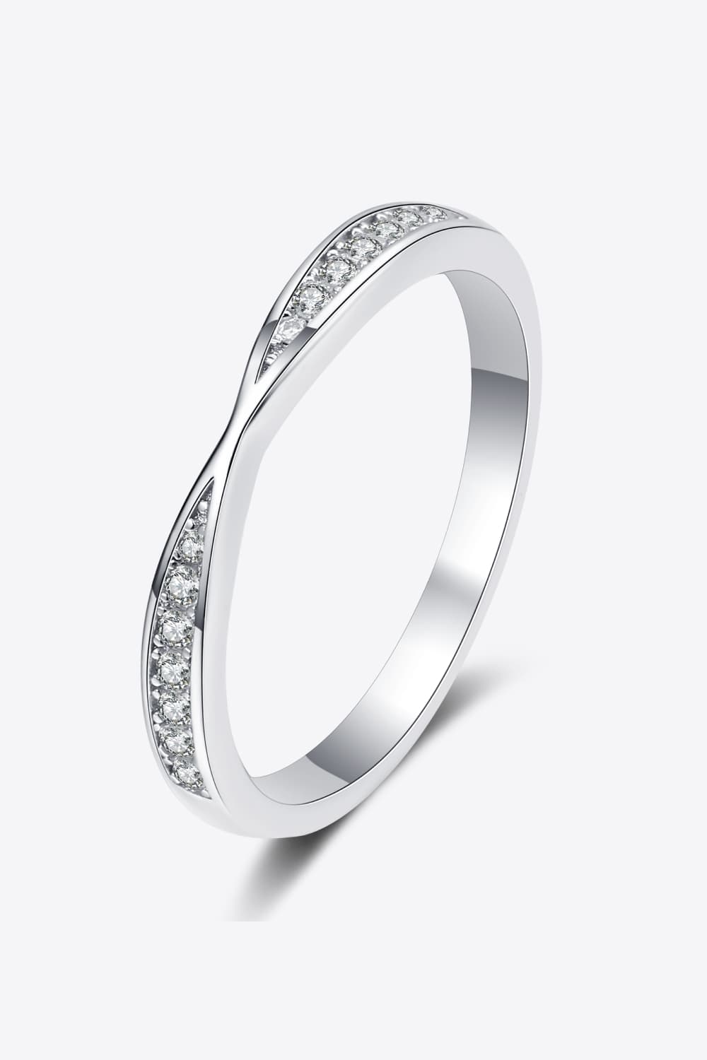 Rhodium-plated moissanite ring with sparkling stones, showcasing a elegant jewelry piece from Plush Fashion Hub.