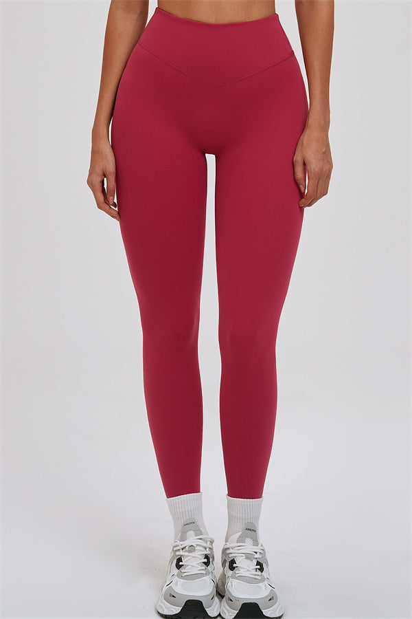 Fitglutes activewear 3-piece set with zip jacket, cross-back sports bra, and leggings, designed for gym and workout routines.