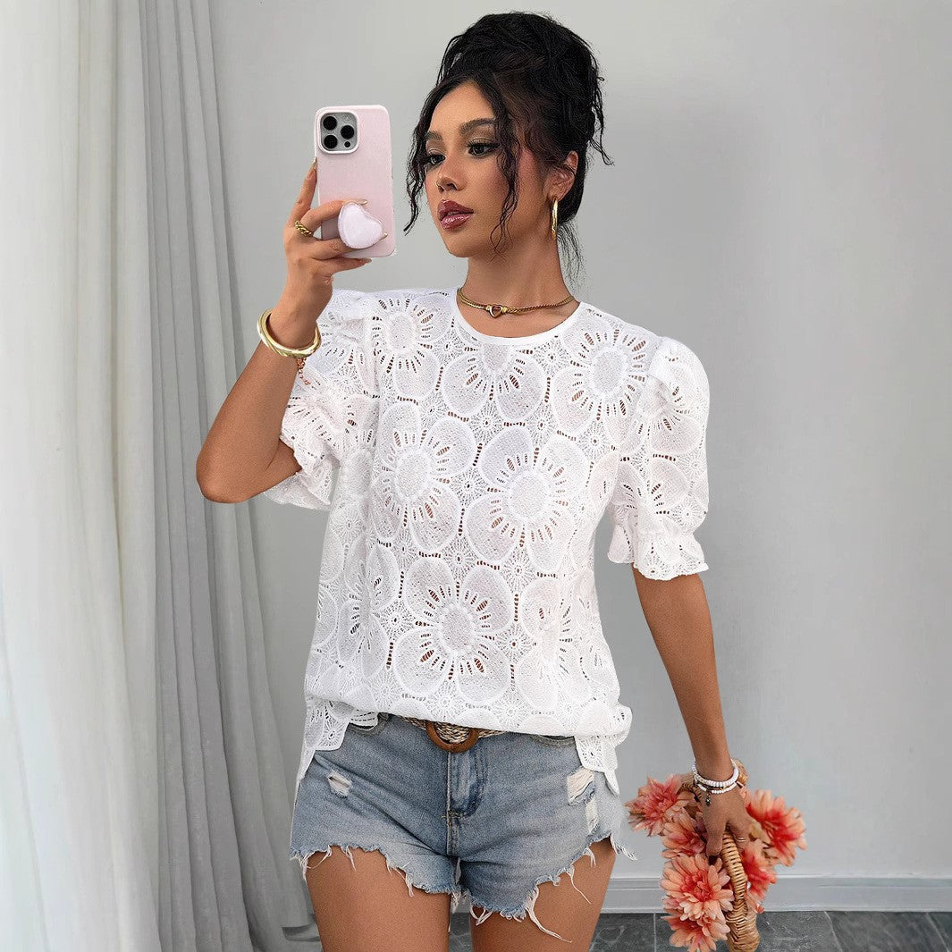 Women's loose fit lace puff-sleeve shirt top with hollow-out design, casualwear by Plush Fashion Hub displayed on a hanger.