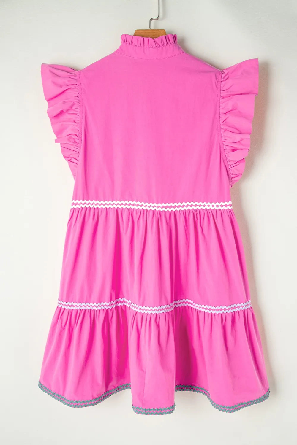 Cotton ruffled notched cap sleeve mini dress by Trendsi, featuring a fitted bodice, ruffle details, and a stylish mini length.