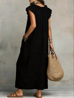 Plus size ruffled v-neck cap sleeve maxi dress by Plush Fashion Hub, featuring a flowy design and elegant ruffle details.